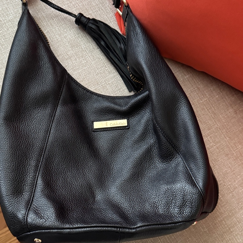 Calvin Klein Black Hobo Bag with Gold Accents
